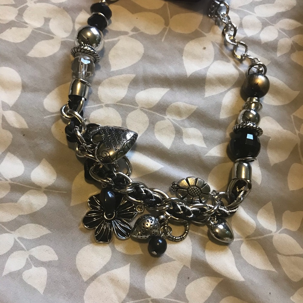 Charm necklace with earrings.